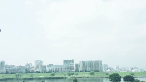 View of cityscape against clear sky