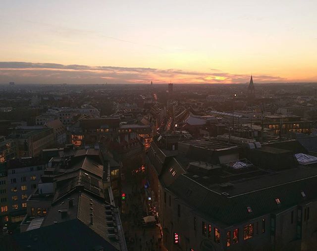 building exterior, cityscape, architecture, built structure, city, crowded, sunset, high angle view, residential district, residential building, residential structure, sky, aerial view, orange color, house, city life, community, outdoors, no people, horizon over land