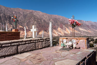 Built structure on mountain against the sky