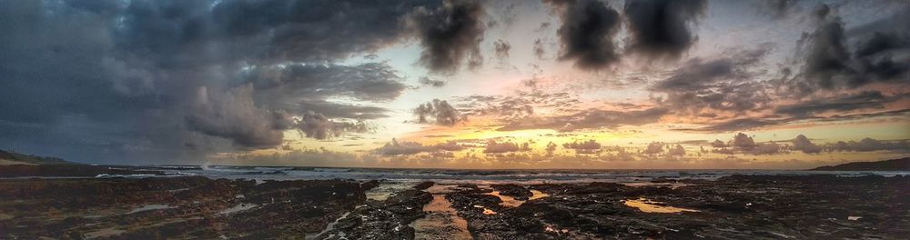 Panoramic view of sea against sky during sunset