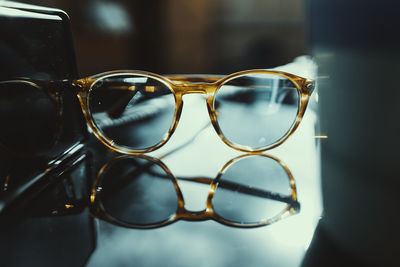 Close-up of eyeglasses on table