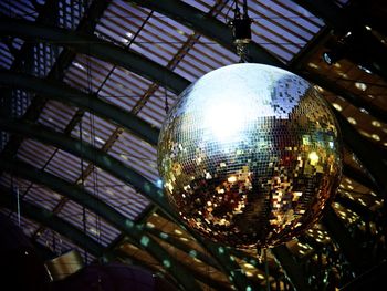 Low angle view of illuminated ceiling