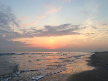 Scenic view of sea at sunset