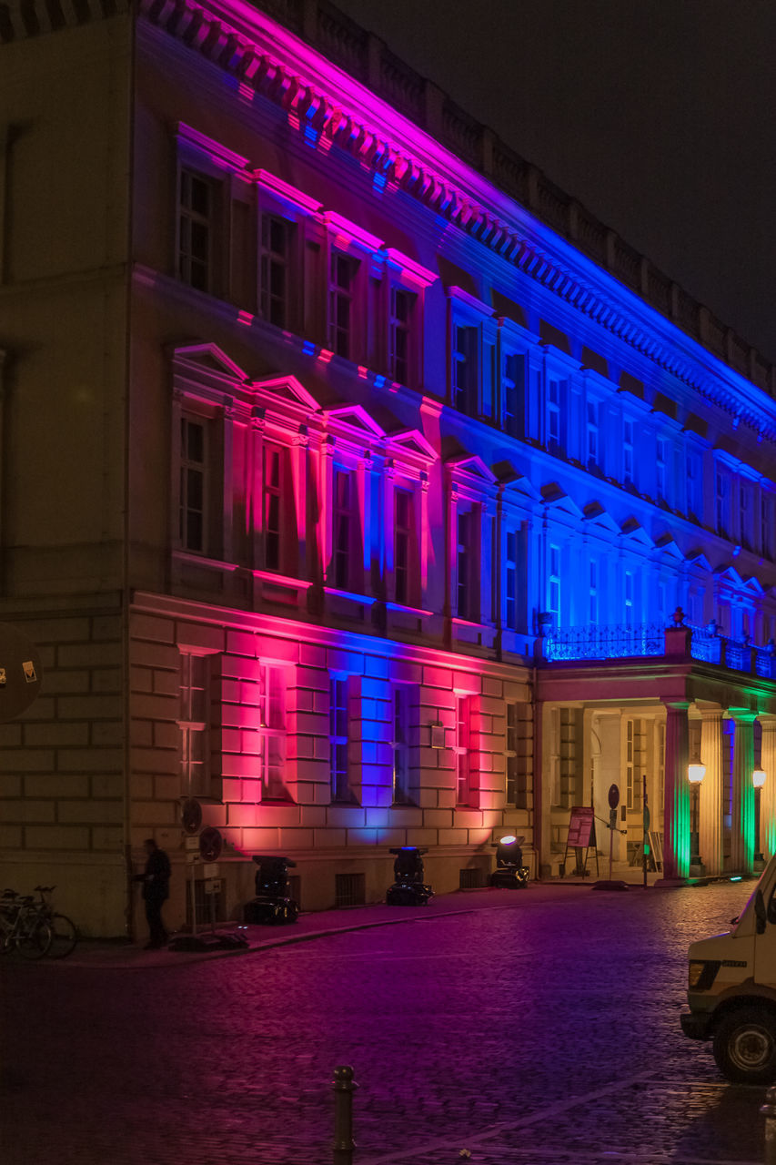 ILLUMINATED BUILDINGS AT NIGHT