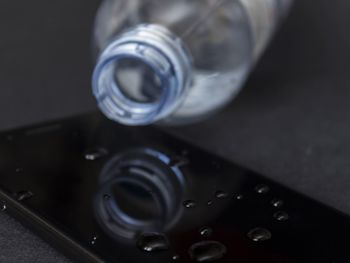 High angle view of wet glass on table