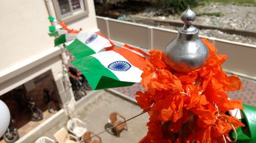 Close-up of flags on wall