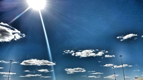 Low angle view of vapor trails in sky