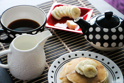 Close-up of tea set on table