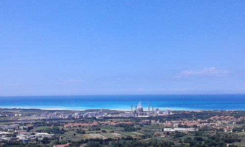 Scenic shot of sea against blue sky