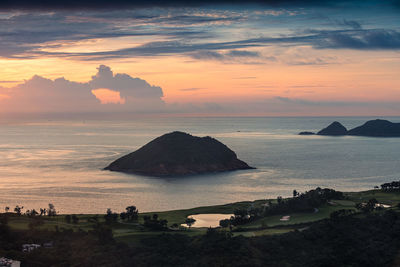 Scenic view of sea against sky during sunrise/sunset