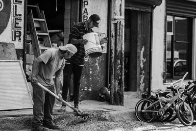 People working on building