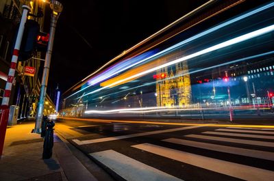 Light trails on street in city at night