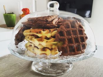 Waffles seen through glass cloche