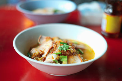 Close-up of soup served on table