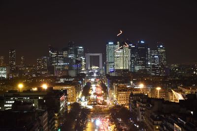 View of city lit up at night