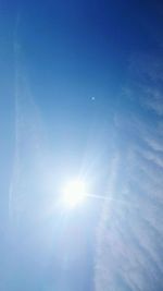 Low angle view of vapor trails in sky