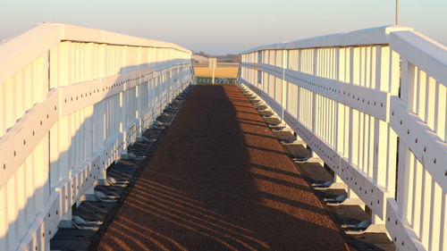 View of empty bridge against clear sky