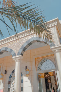 Low angle view of ornate building against clear sky