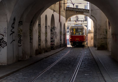 Train on railroad track in city