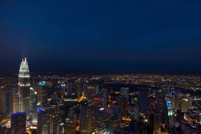 Illuminated cityscape at night