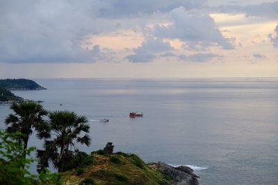 High angle view of boat sailing on sea against sky