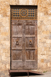 Closed door of old house