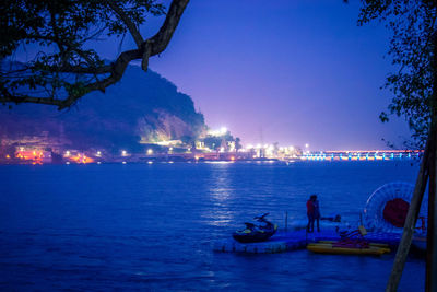 Scenic view of sea against sky at night