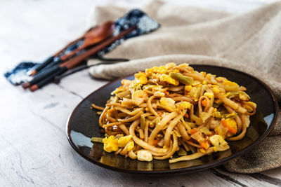 Close-up of noodles in plate on table