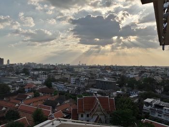 High angle view of buildings in city against sky