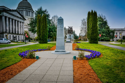 Statue in front of building