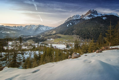 Scenic view of snowcapped mountains against sky