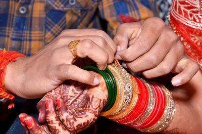 Close-up of woman holding hands