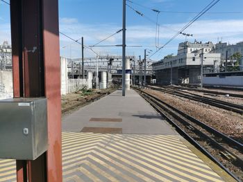 Railroad station platform against sky