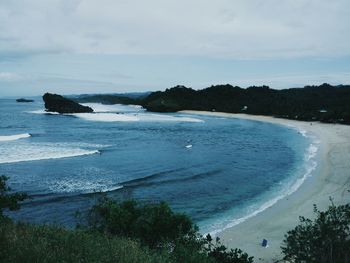 Scenic view of beach against sky