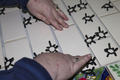 High angle view of man playing on table