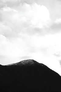 Low angle view of silhouette mountain against sky