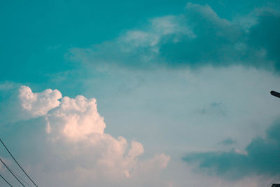 Low angle view of cloudscape against blue sky