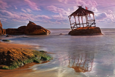 View of calm beach against sky