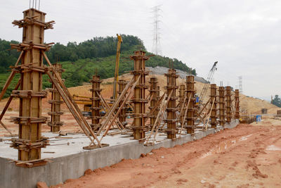 Construction site on field against sky