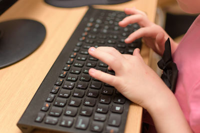 Close-up of hands using mobile phone