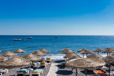 Scenic view of sea against blue sky