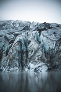 A glacier on its lake like an ice cube on your glass