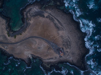 High angle view of sea and rocks