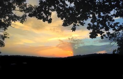 Scenic view of silhouette landscape against sky during sunset