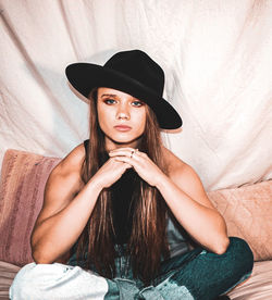 Portrait of woman wearing hat