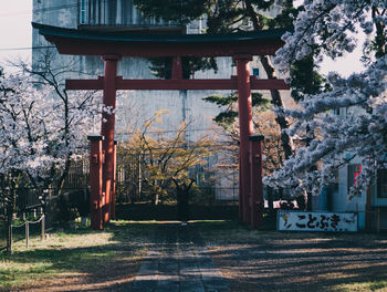 Entrance of temple against building