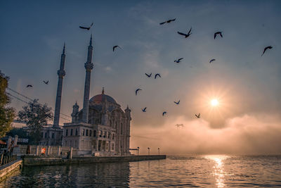 Ortakoy mosque and 15 july martyrs in foggy morning istanbul turkey 