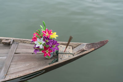 High angle view of a small boat floating on  a river