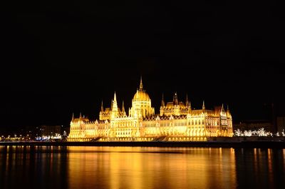 Illuminated city lit up at night