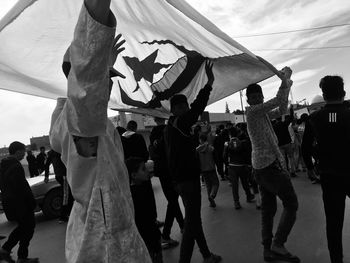 People walking on street in city